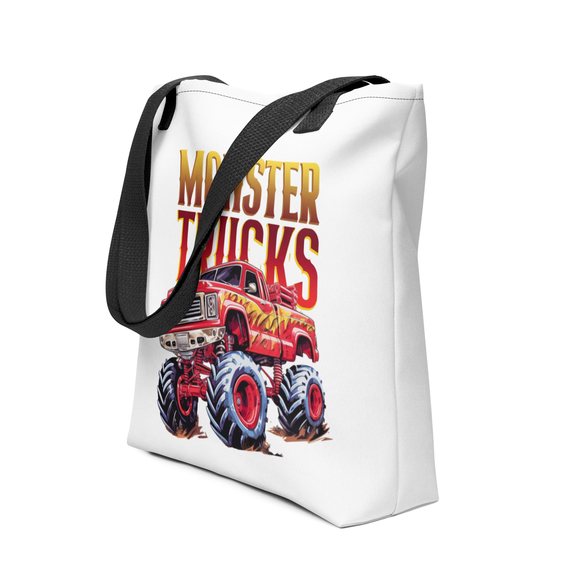 Stoere all-over print tote bag met rode monster truck design en grote zwarte handvatten.rechts aanzicht